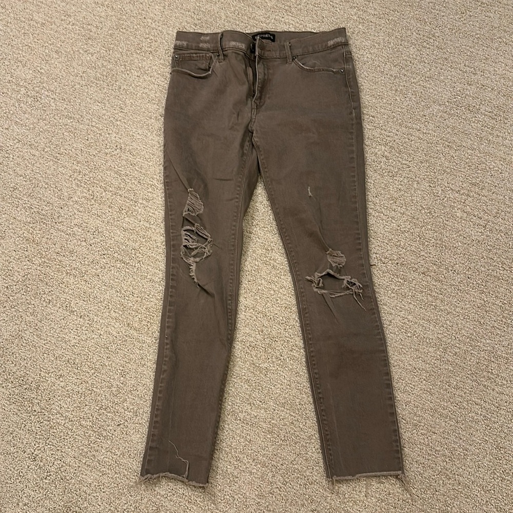 Ankle legging brown express jeans, size 4 regular with holes.